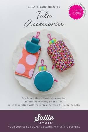 Clip-on paper sewing pattern envelope with teal, pink, and orange illustrated accessories