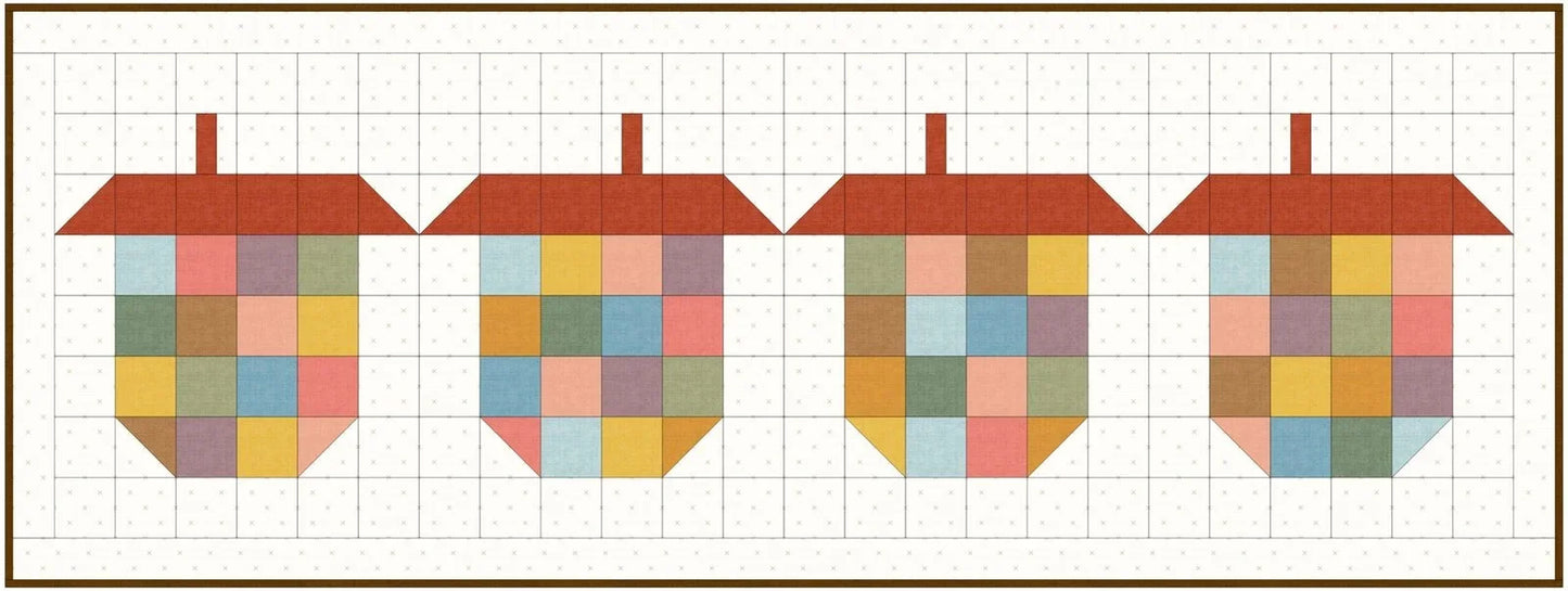 Multicolor patchwork table runner pattern with heart block sections on a grid