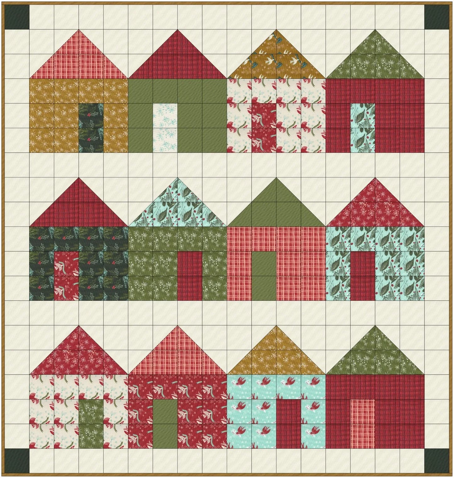 Patchwork quilt with house block pattern in red, green, and cream