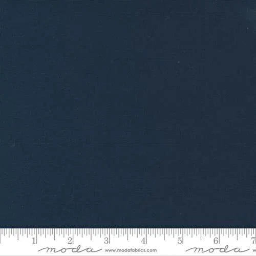 Solid navy quilt backing fabric, plain woven texture