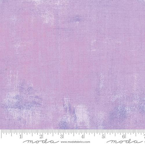 Textured quilting cotton fabric, light freesia lavender with subtle mottled pattern