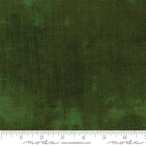 Cotton fabric swatch in forest green with subtle grunge texture; printed pattern