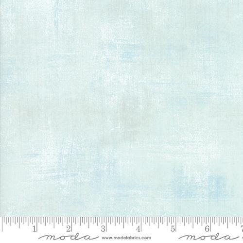 Light blue textured fabric swatch