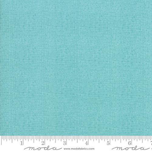 Seafoam blue textured cotton fabric swatch, fine crosshatch weave