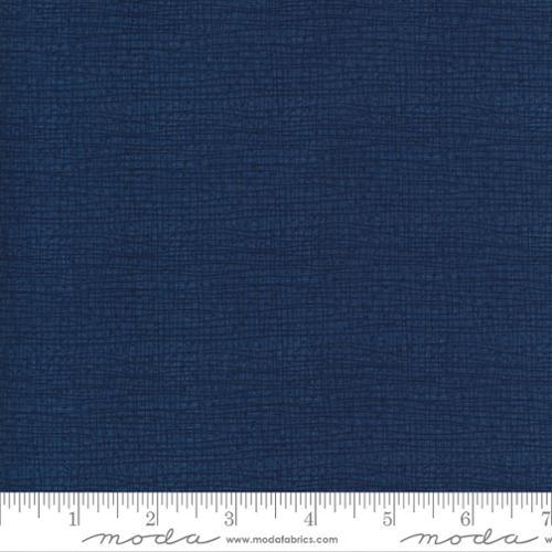 Thatched woven fabric, deep midnight blue with fine textured pattern