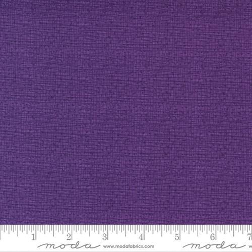 Purple woven cotton fabric with fine textured grain