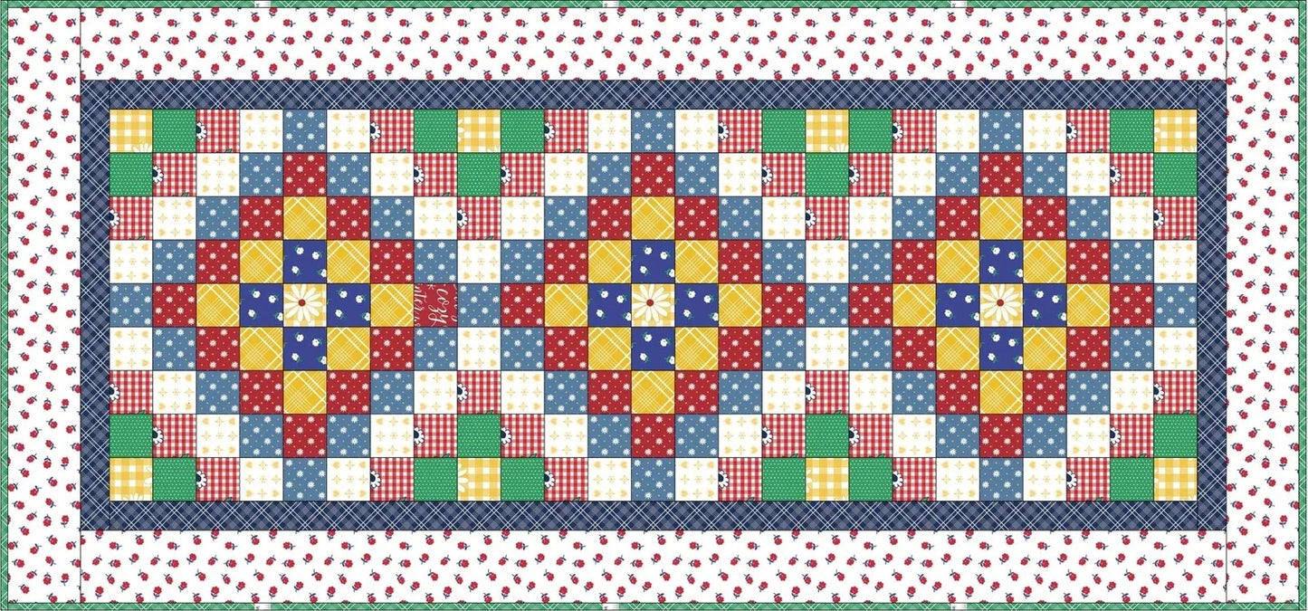 Patchwork table runner with colorful mosaic grid of square blocks