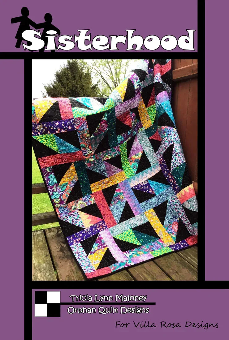 Patchwork quilt pattern with multicolor geometric triangle blocks