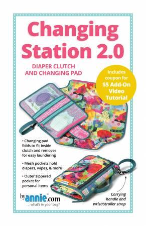 Diaper clutch changing station with fold-out changing pad and zipper pockets
