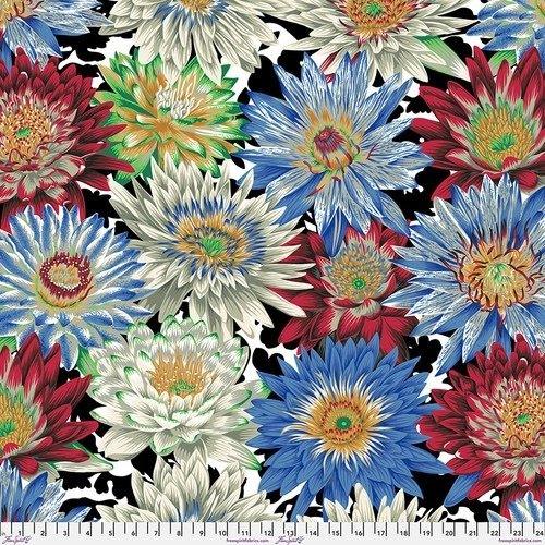 Tropical floral fabric with large blue, red, and white flower motifs