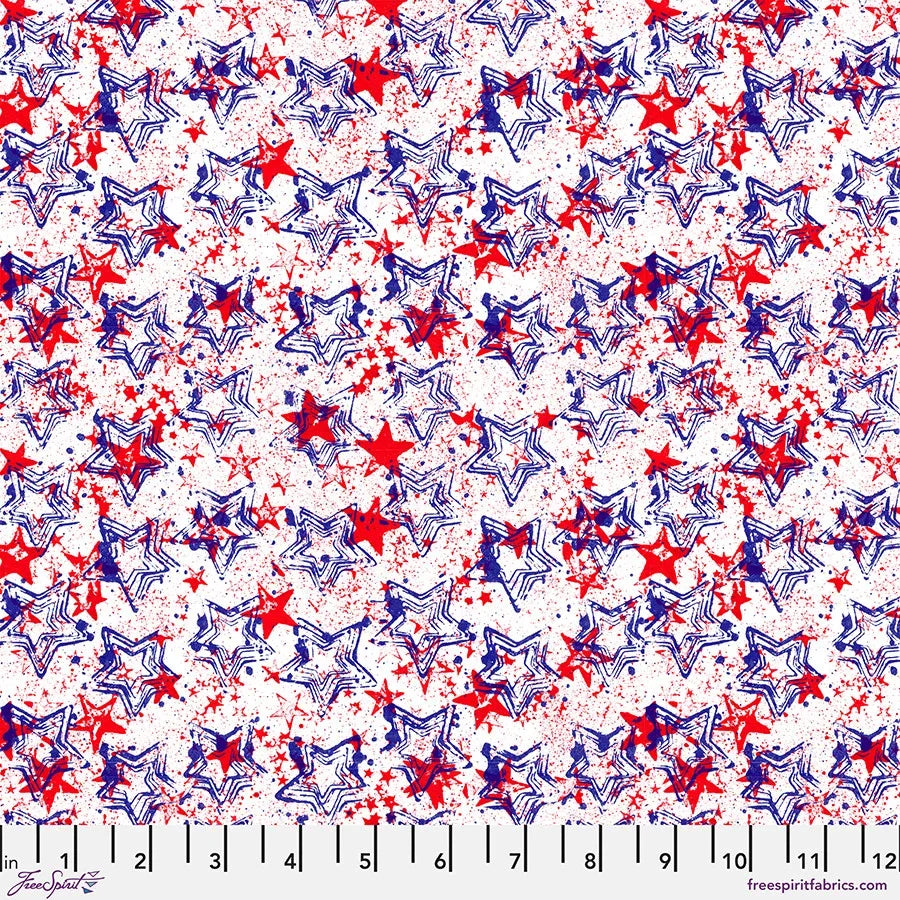 Patriotic star print fabric with red, white, and blue shooting stars