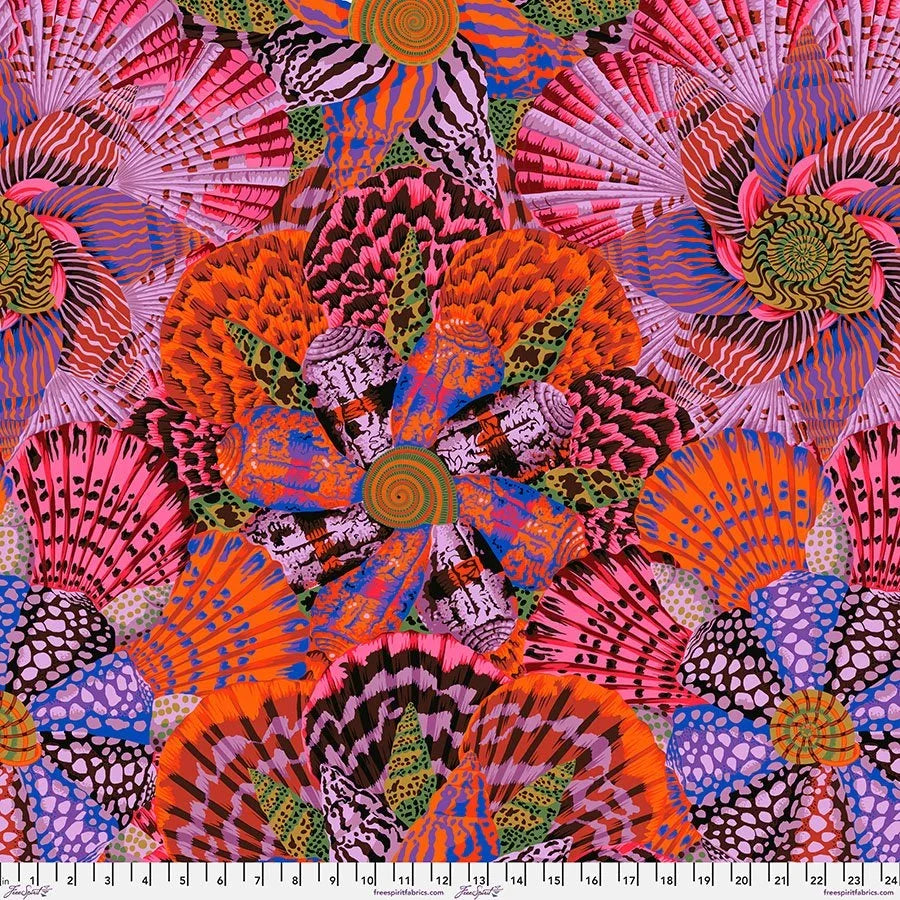 Red multicolor abstract quilting fabric with fan, spiral and animal-print motifs