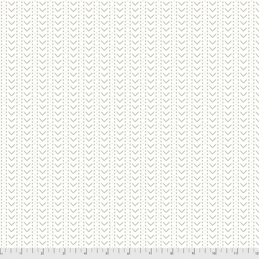 White fabric swatch with small repeating wind-style motif pattern