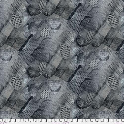 Gray printed fabric with circular dots and dark botanical shapes in repeating pattern