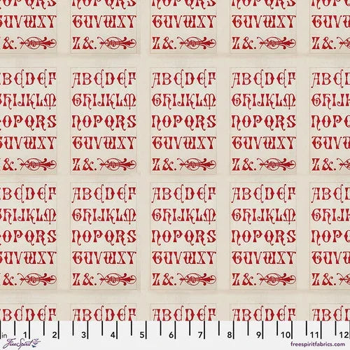 Red and off-white typography patterned cotton fabric with repeating letter motifs