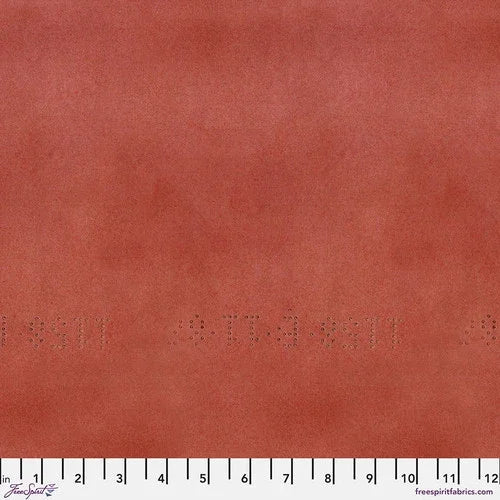 Red vintage fabric with subtle texture and small printed dots