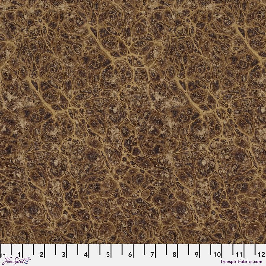 Neutral marble-inspired patterned fabric with swirling tan and brown motifs
