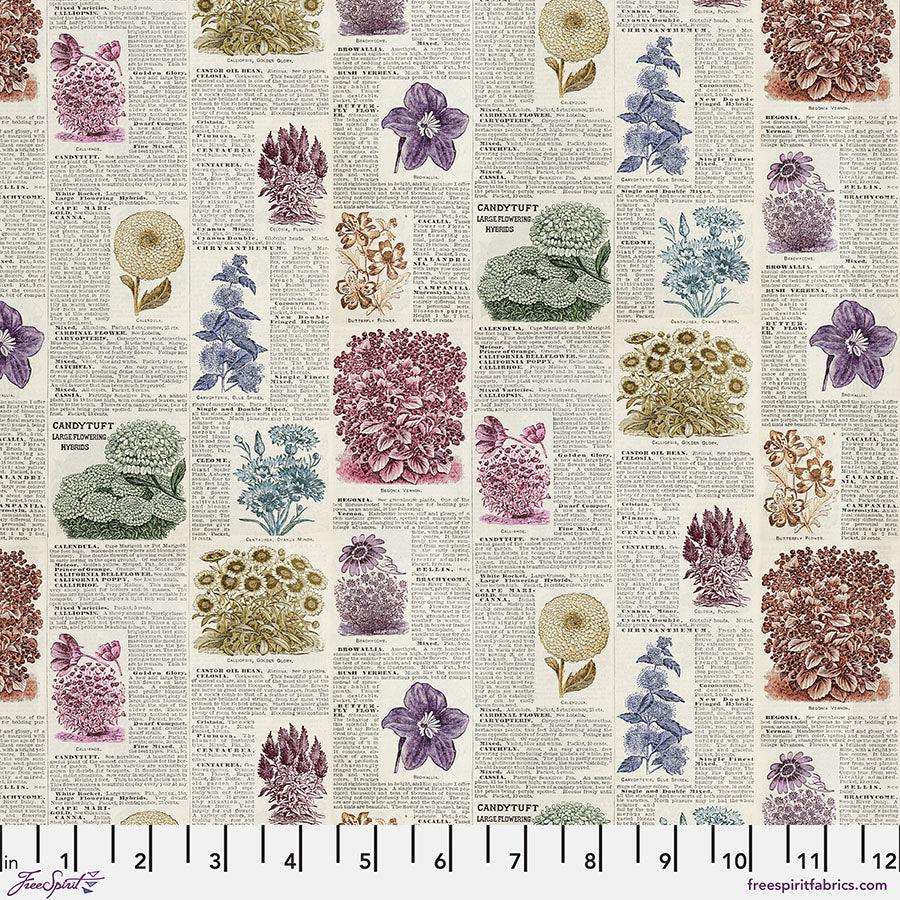 Botanical print fabric with purple, blue, pink, and green flowers and text blocks