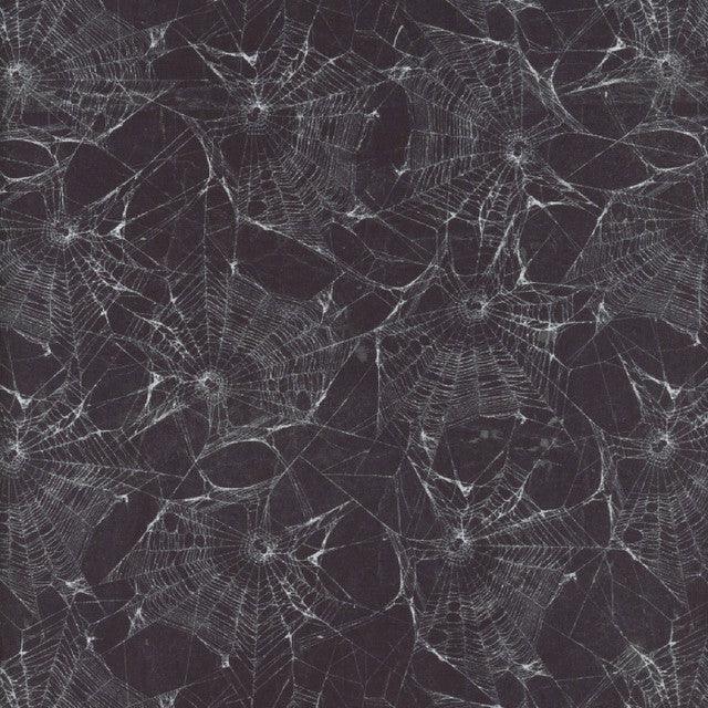 Halloween spiderweb fabric with white web pattern on dark purple base