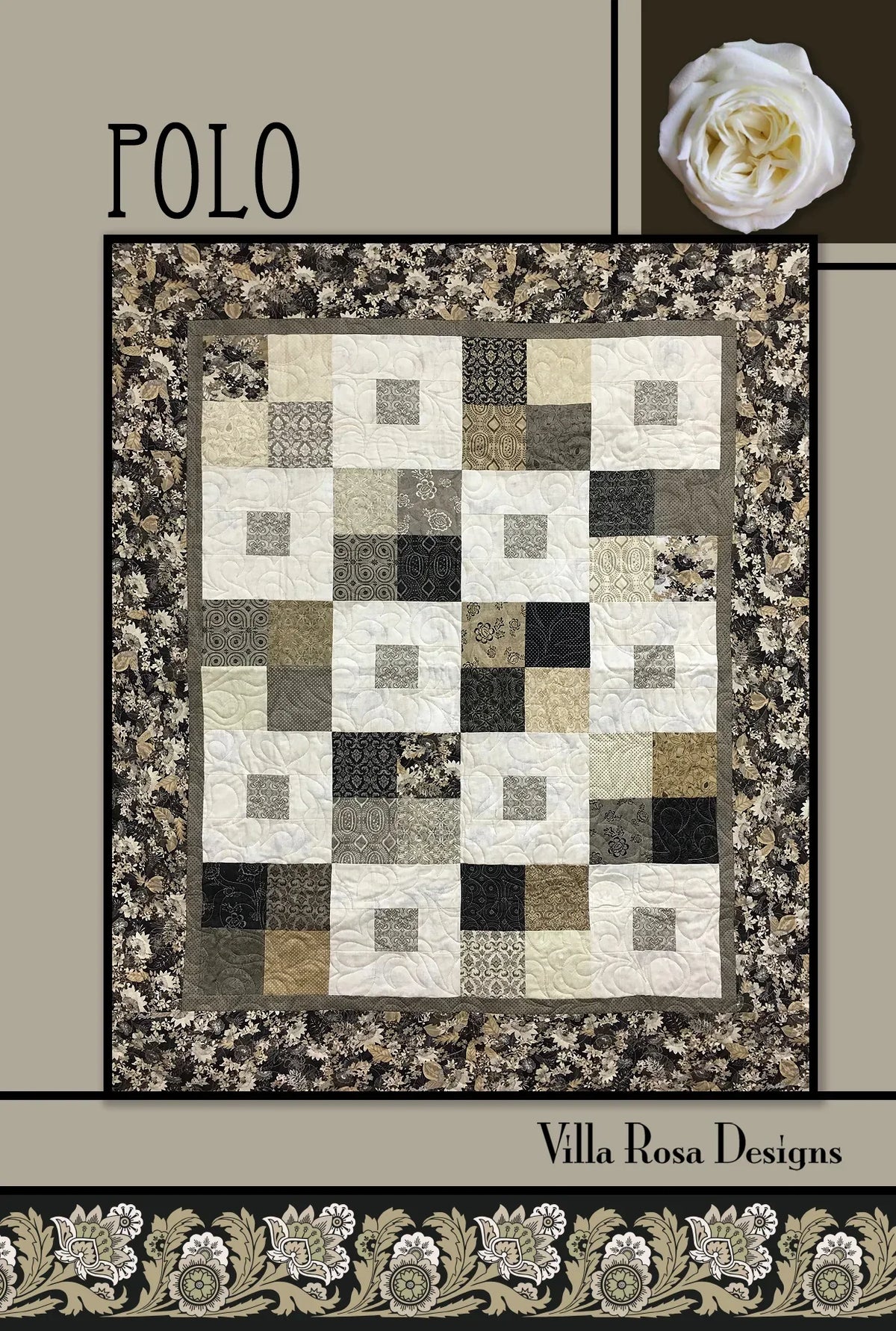 Patchwork quilt with geometric square blocks and dark floral border, cream and olive tones
