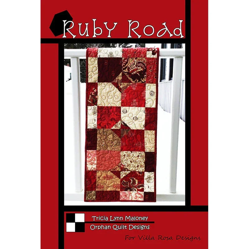 Patchwork tablerunner quilt pattern with red, cream, and brown block design