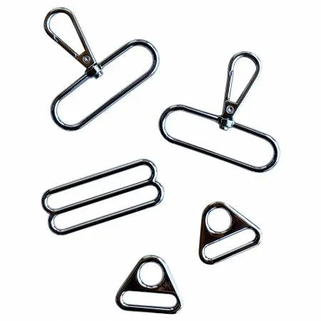 Metal hardware kit pieces: binder clips and corner clips