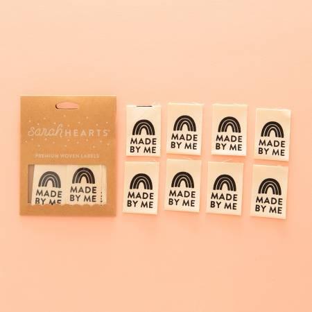 Organic cotton label packs with Made by Me and rainbow icon