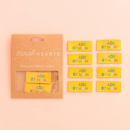 Woven fabric label set with multiple "Made by Mom" tags