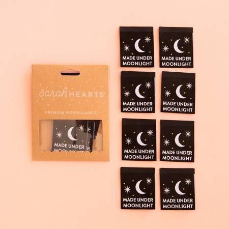 Black label set with moon icon and "Made Under Moonlight" text