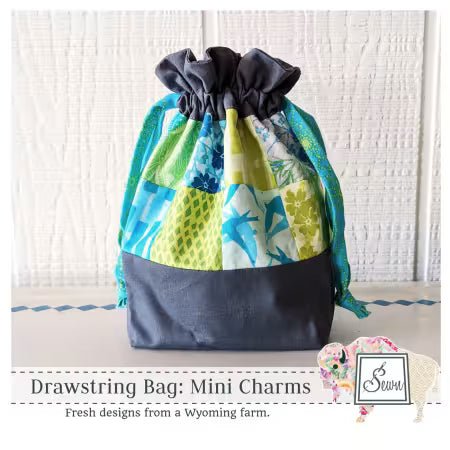 Patchwork mini drawstring bag with gathered dark top and teal drawcord