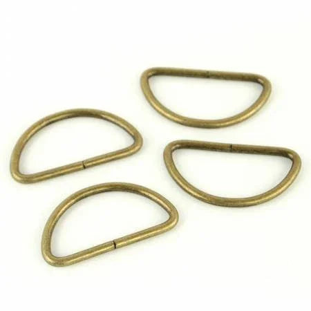 Four 1.5 in antique brass D-ring metal hardware loops
