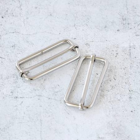 Two nickel slider buckles with rectangular frames and sliding bars