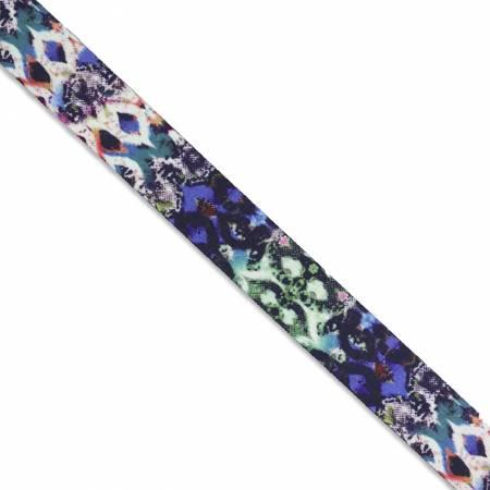 Printed webbing tape with grunge multicolor pattern in navy, teal, and lavender.