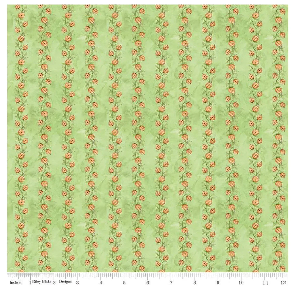 Green pumpkin vine quilting fabric with repeating orange pumpkins and vines.