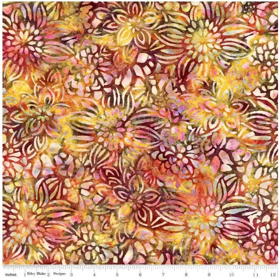 Floral batik fabric with multicolor golden, pink, purple blooms and swirling accents.