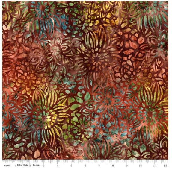 Batik quilting fabric with floral reflections and autumn leaves pattern in red, green, teal
