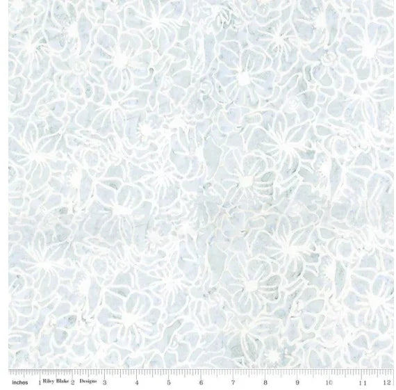 Light blue floral batik cotton fabric with reflective white motif pattern