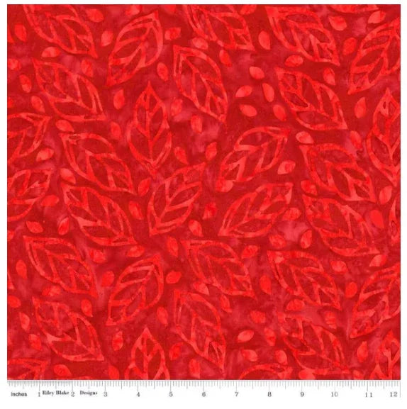 Cherry red floral batik fabric with leaf and petal pattern, repeating allover