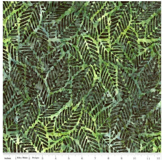 Floral batik fabric with repeating leafy reflections pattern in green and chartreuse