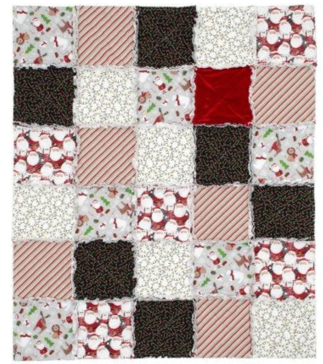 Holiday quilt fabric squares in red, white, black, and striped plus motif prints