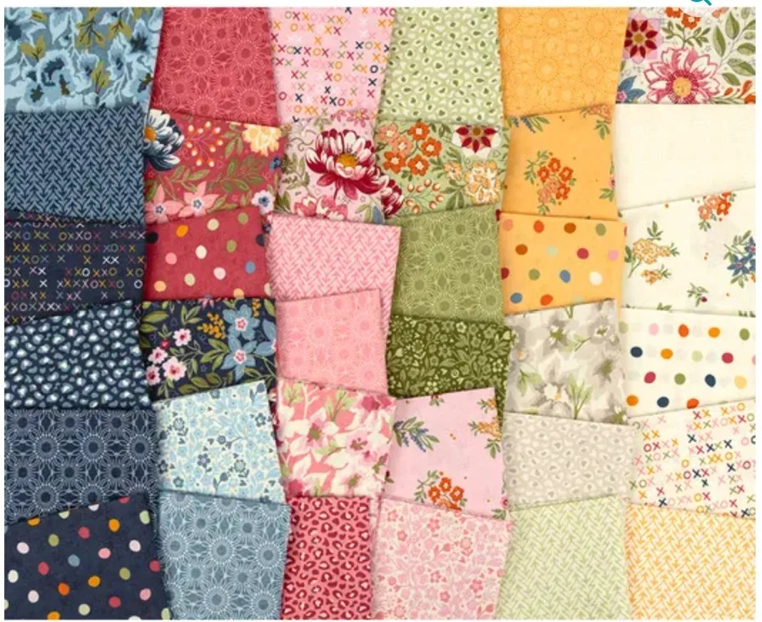 Assorted patchwork fabric squares charm pack in blue, pink, red, green, and cream