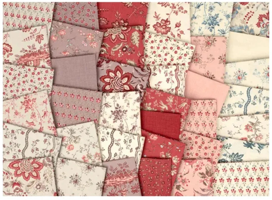 Fleur de Paris mini charm pack fabric squares with mixed floral prints in red and pink