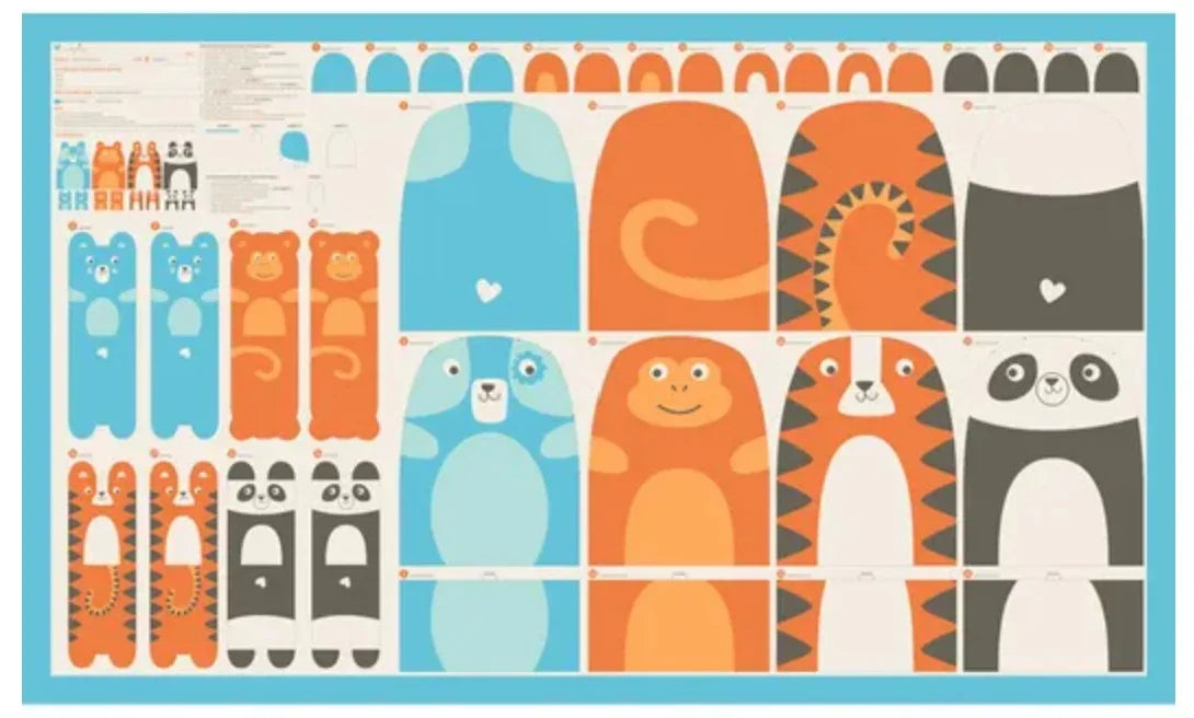 Animal-themed fabric panel with assorted animal faces and shapes in multicolor