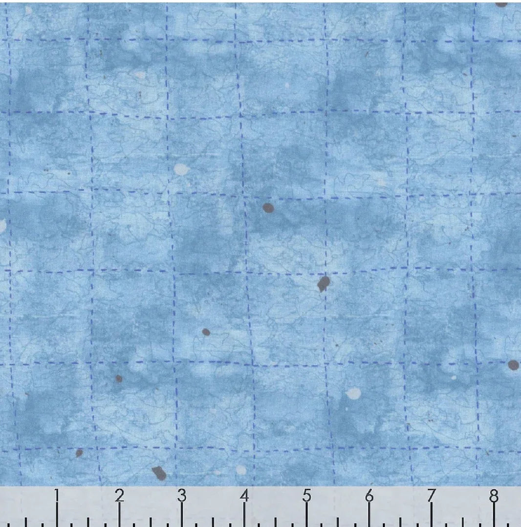 Light blue printed fabric with grid lines and scattered dots, abstract print
