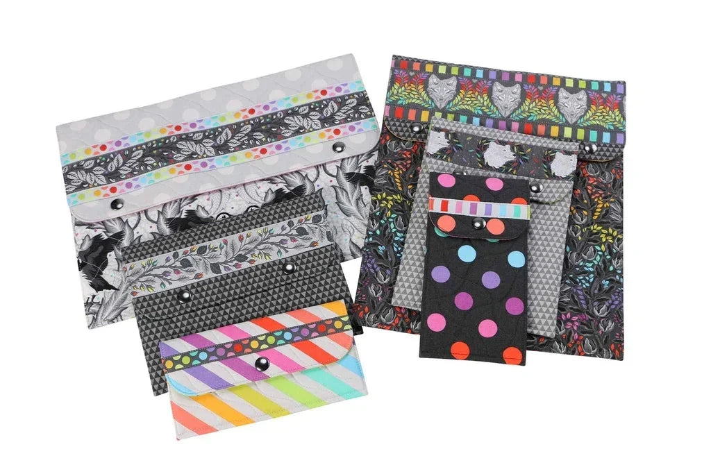 Fabric snap sleeves assortment in gray, black, and colorful dot patterns