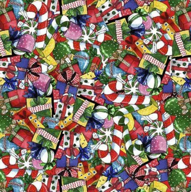 Christmas quilt fabric with candy cane, lollipop, and present ornaments pattern