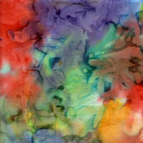 Batik yardage fabric with multicolor abstract swirls in red, blue, green, and yellow