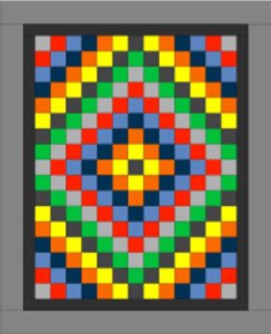 2-panel Trip Around the World quilt block pattern with multicolor geometric grid