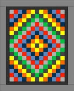 2-panel Trip Around the World quilt block pattern with multicolor geometric grid