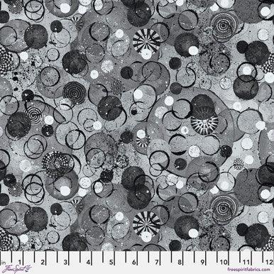 Gray fabric with black and white circular swirl pattern